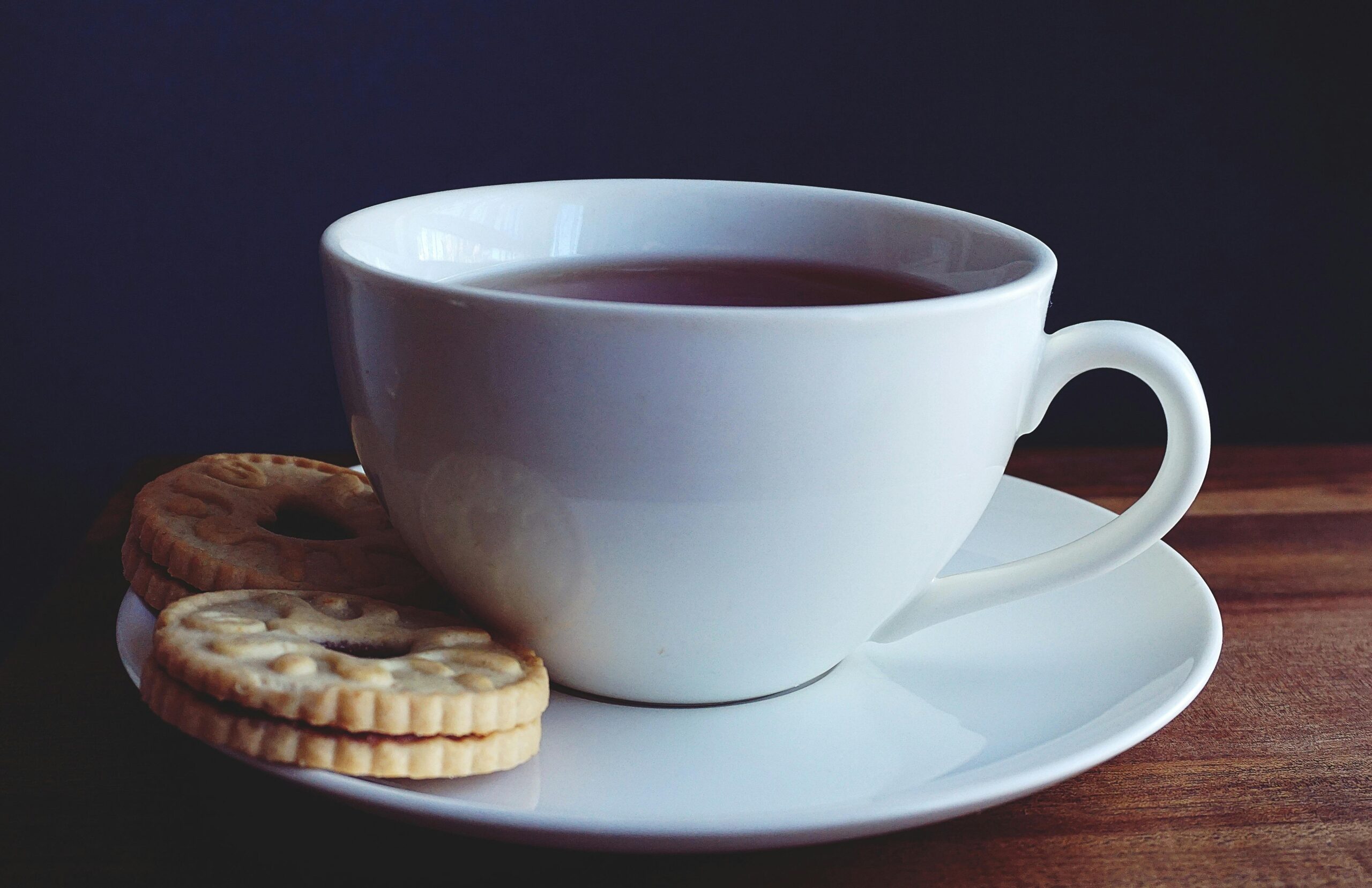 coffee cup with biscuit