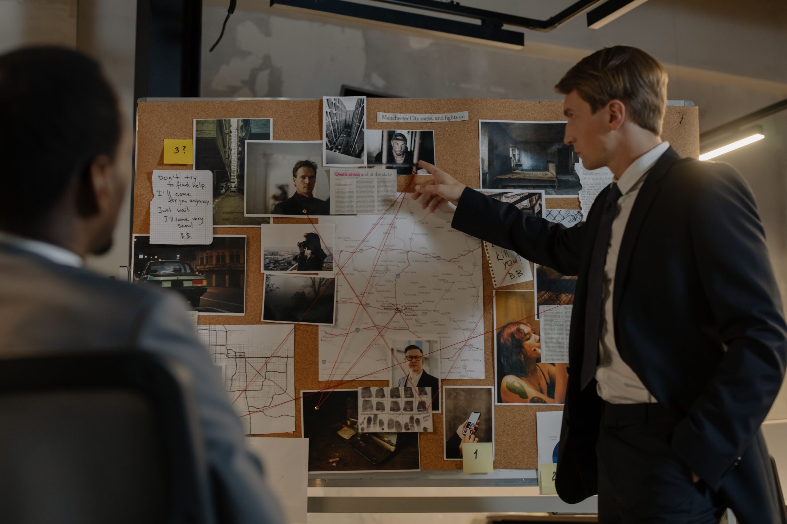 detective with crime board